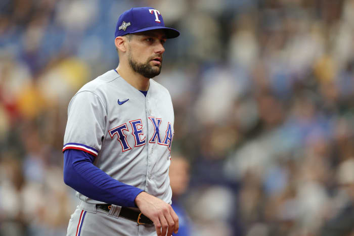 Oct 4, 2023; St. Petersburg, Florida, USA; Texas Rangers starting pitcher Nathan Eovaldi (17) leaves the mound at the end of the first inning against the Tampa Bay Rays during game two of the Wildcard series for the 2023 MLB playoffs at Tropicana Field. Mandatory Credit: Nathan Ray Seebeck-USA TODAY Sports